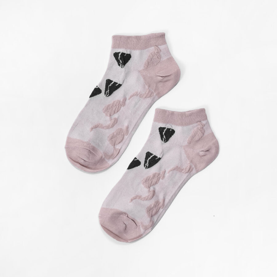 Pair of pink sheer ankle socks with a heart pattern