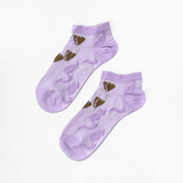 Pair of purple sheer ankle socks with a heart pattern