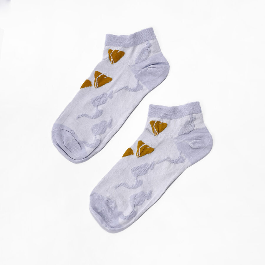 Pair of purple sheer ankle socks with a heart pattern